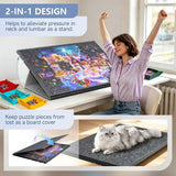 The protective cover placed flat over an unfinished jigsaw puzzle on the felt board, keeping pieces safe from dust and pets.